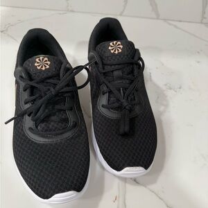 Black Nike Sneakers with White Soles